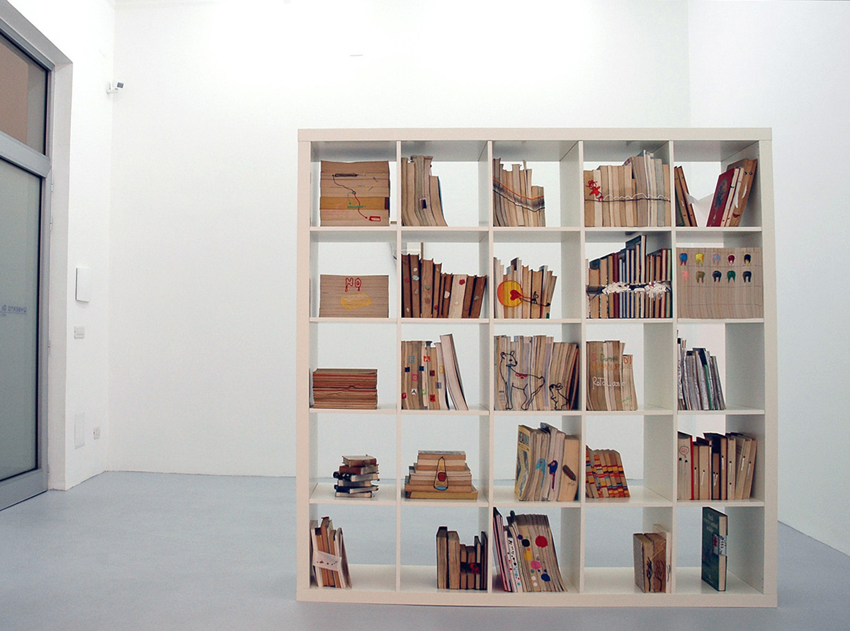 vedovamazzei, 2005, exhibition view at Galleria Umberto Di Marino, Napoli, Italy Don’t let me be misunderstood II, 2005, bookcase, books, mixed media, cm 184 x 184 x 39